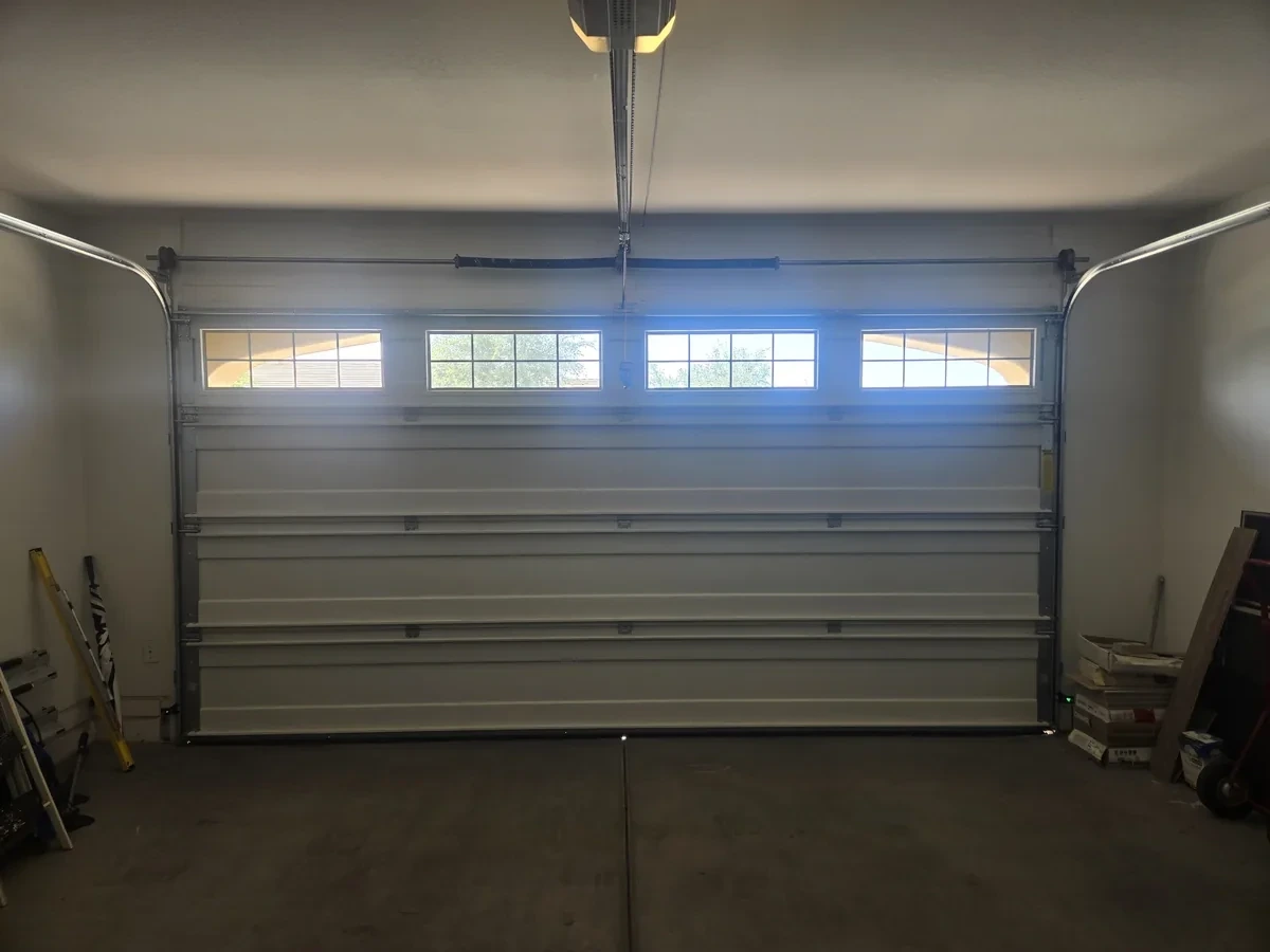 New residential garage door with windows installed and operational, Copper State Garage Pros, East Valley, AZ